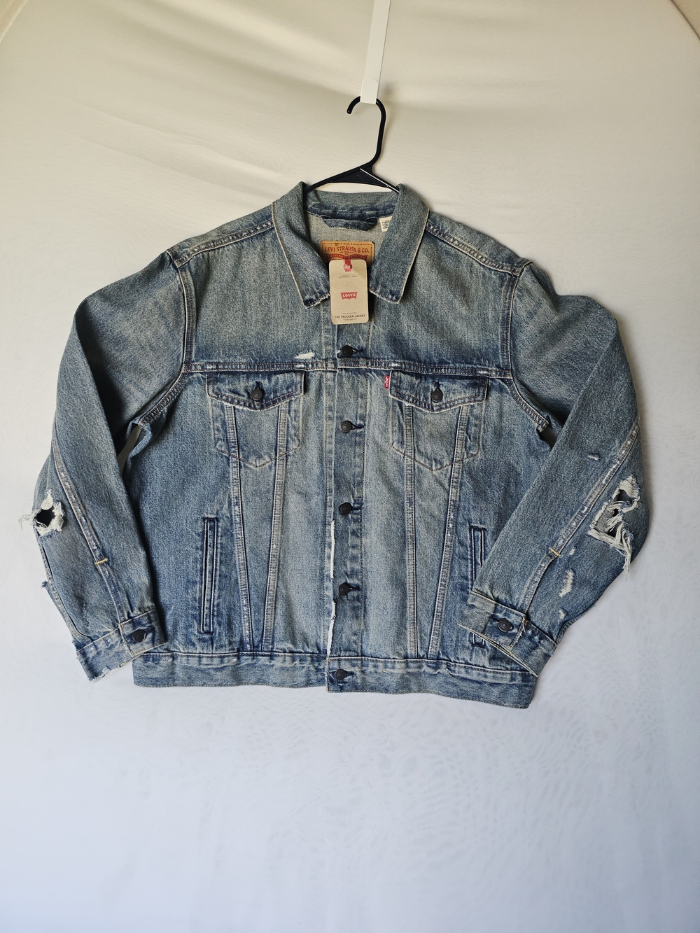 NWT Levi's Denim Jacket "The Trucker Jacket" – Distressed Style – Size XL
